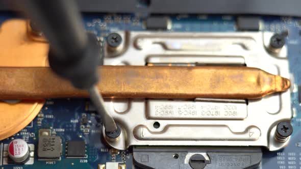 Belarus Minsk 25 May 2021 Installing a Copper Cooling System on a Laptop Processor Copper Heatsink alt