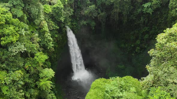 Aerial View Rainforest with a Large Waterfall on the Top. Bali, Indonesia