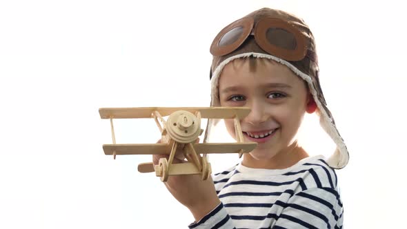 Happy Boy Playing in the Pilot with the Aircraft alt