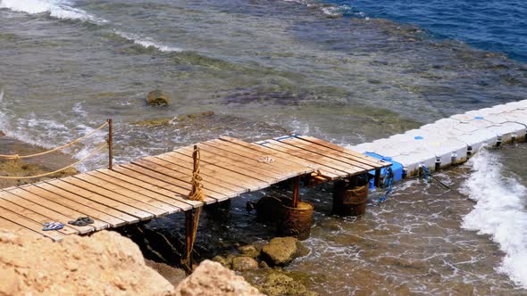 Pier or Pontoon on a Beach in Egypt Over a Reef Off the Coast of the Red Sea, Egypt alt