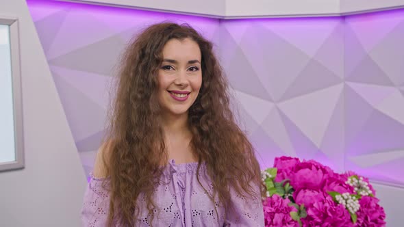 Girl TV Presenter Smiling Looking at the Camera Beautiful Smile of the Girl alt