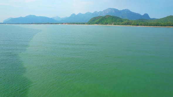 4K Aerial view of drone move on beautiful sea. Flight over ocean, open sea. alt