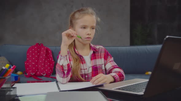 Pretty Schoolgirl Tired of Doing Homework Indoors alt