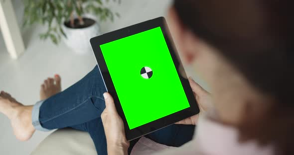 Woman Holding Tablet Chromakey Indoors