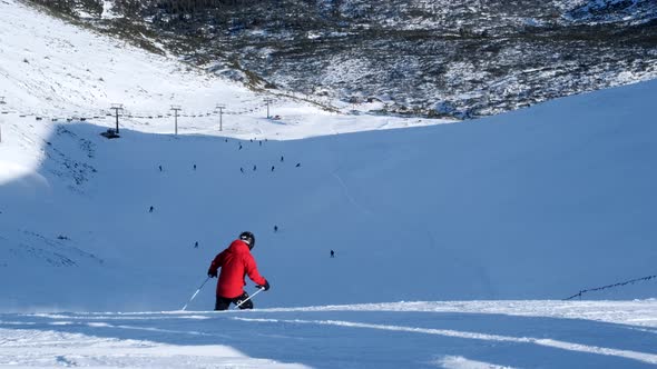 Skiers are Skiing on the Slopes in the Mountains Mountain Downhill  60p alt