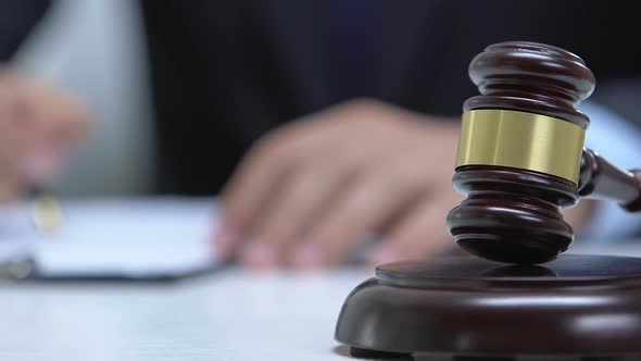 Male Lawyer Working With Court Document, Gavel on Table, Justice Concept alt