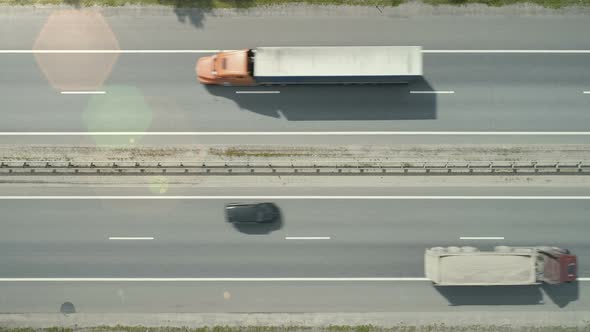 Aerial View on the Highway with Autos and Trucks alt