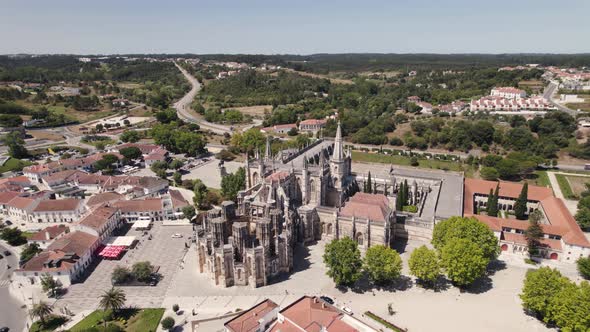 Aerial orbiting over Gothic Monastery of Santa Maria da Vitória, Batalha - Portugal alt
