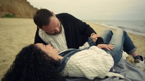 Couple Enjoying Romantic Date at Beach alt