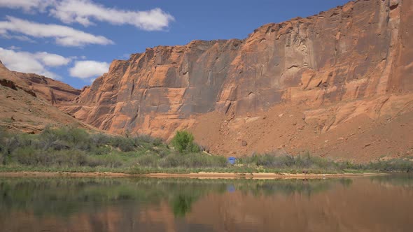 Colorado River and a vertical cliff alt