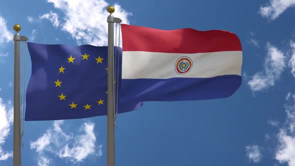European Union Flag Vs Paraguay Flag On Flagpole alt