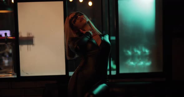 Sexy Naughty Woman Posing in Night Bar alt