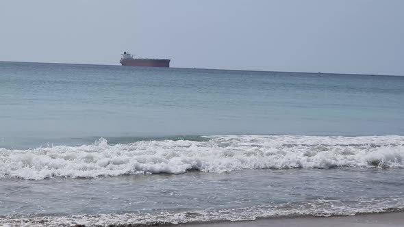 Tanker Ship On Horizon Sunny Beach