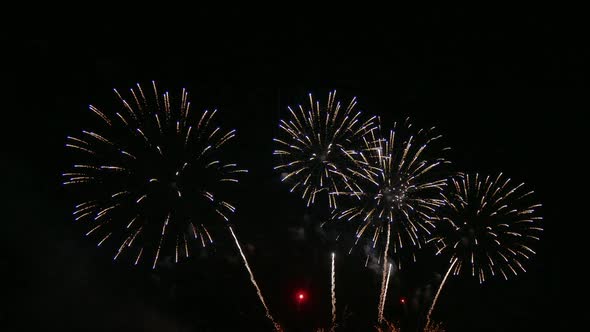 Colorful Firework display at night on sky background alt