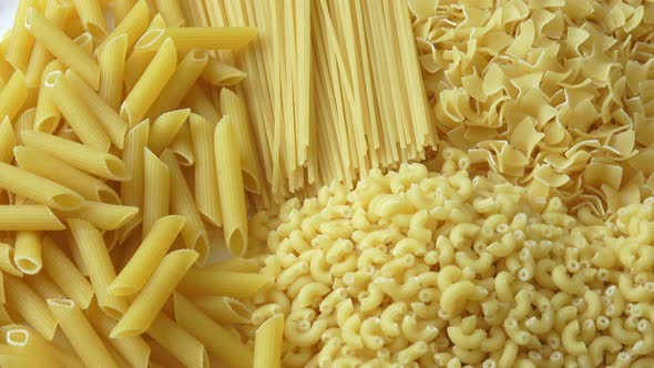 Set of raw dry pasta. Variety of types of Italian pasta.