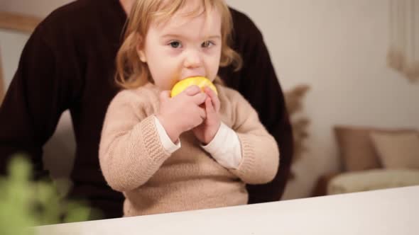 A Lgirl Eats an Apple