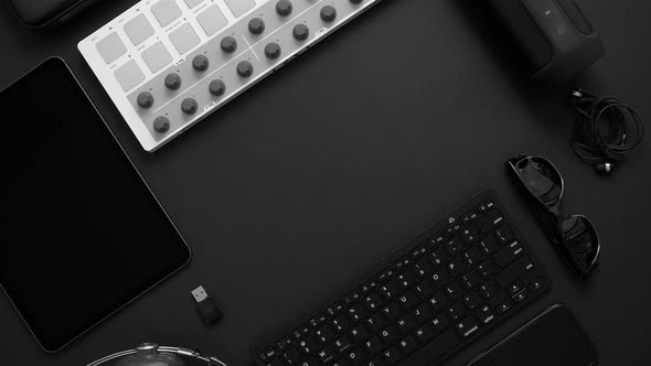 Audio Producer Concept. Various Digital Recording Audio Music Gadgets Placed on Black Background. alt