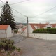 Red Tile Roof Houses in Azenhas do Mar on a Cloudy Day - VideoHive Item for Sale