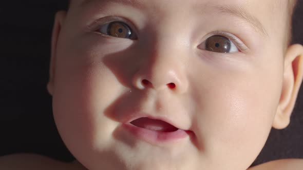 The Look of the Baby in the Camera Close Up Shot alt