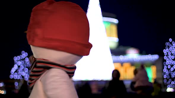 Amusing Snowman Funny Dancing Against Backdrop of Christmas Tree, Good Mood alt