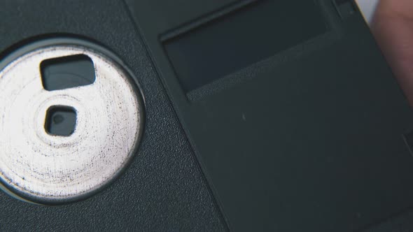 Fingers Move Parts of Oldfashioned Floppy Disc Macro alt