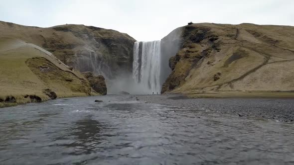 Flying low to a huge waterfall