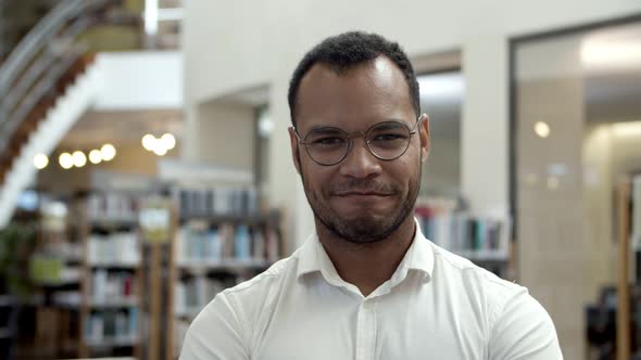 Smiling African American Man Posing at Public Library alt