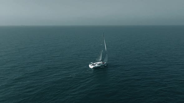 Sun at Ocean Bay with Luxury Yacht Aerial
