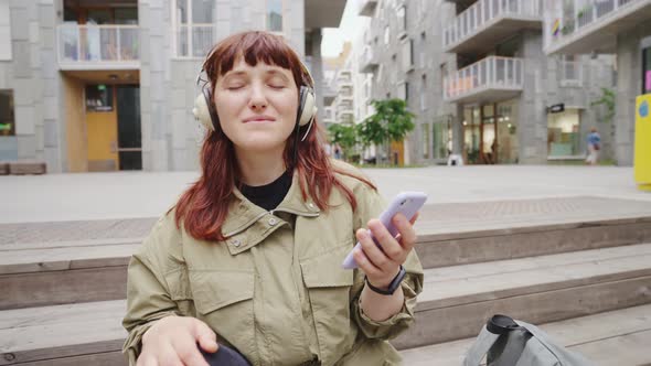 Girl Listening to Music Mobile Phone Headphones Slow Motion alt