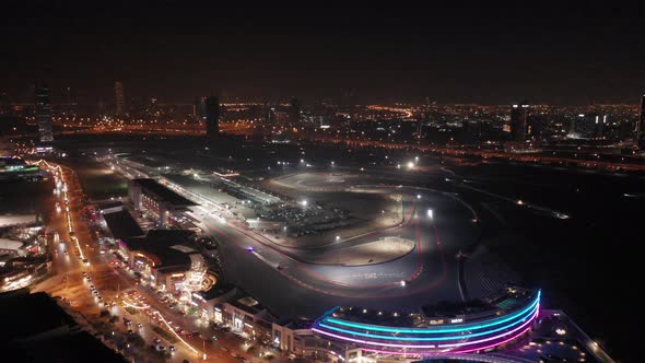 Aerial view of full Dubai Autodrome race track, endurance racing during night endurance competition