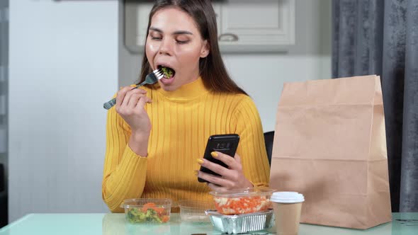 Sits at Home Alone and Eats Food with Delivery for Dinner alt