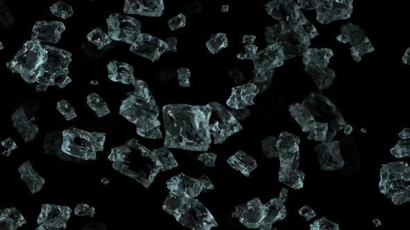 Particles of ice falling down on a black background