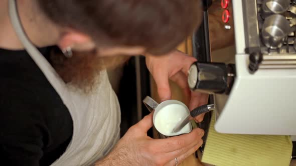 Barista Making Coffee in Coffeeshop