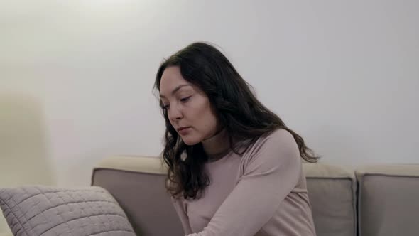 Sadness and Melancholy of Young Woman Lady Is Lying on Couch and Thinking Love and Relations Problem alt