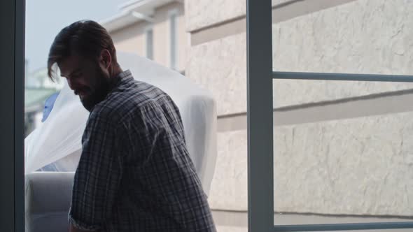 Beautiful Family Entering New House alt