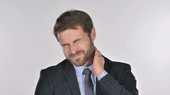 Businessman with Neck Pain White Background alt