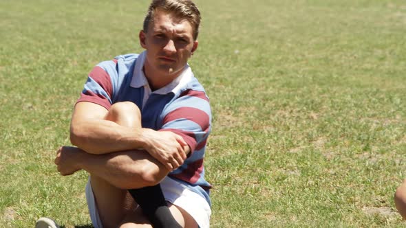 Rugby players taking a break on the field 4K 4k alt