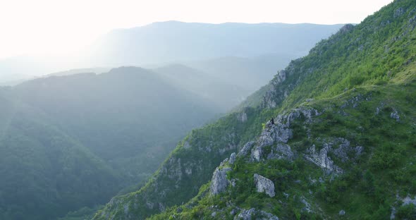 Cinematic Shot of a Hero on a Mountain alt