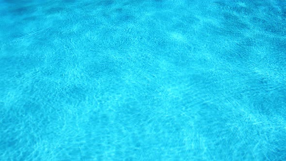 Blue water in swimming pool