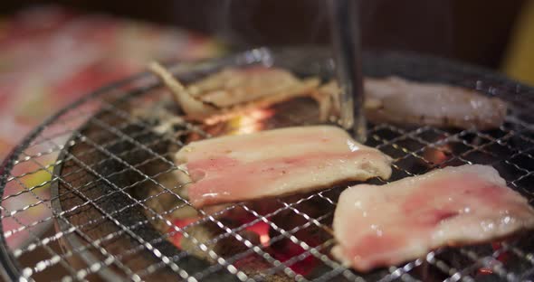 Japanese style meat barbecue in restaurant alt