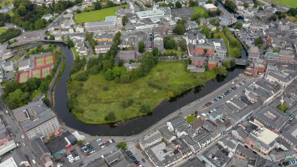 High Angle Footage of River Winding Through Town alt