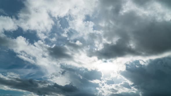 Building motions clouds. Puffy fluffy white clouds sky time lapse.