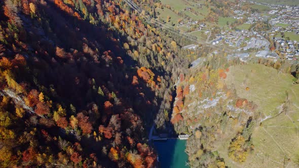 Drone Flight Over Klammsee Reservoir And Autumn Trees alt