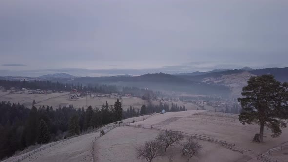 Flight Over the Village in the Carpathian Mountains alt