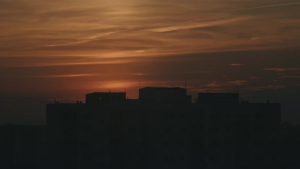 The Sun Hides Behind the Buildings, sunset timelapse shot