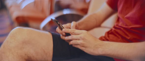 Man hands typing on the phone