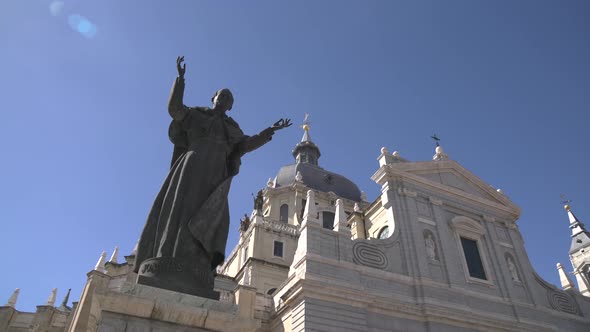 Juanes Paulus statue at the Almudena Cathedral alt