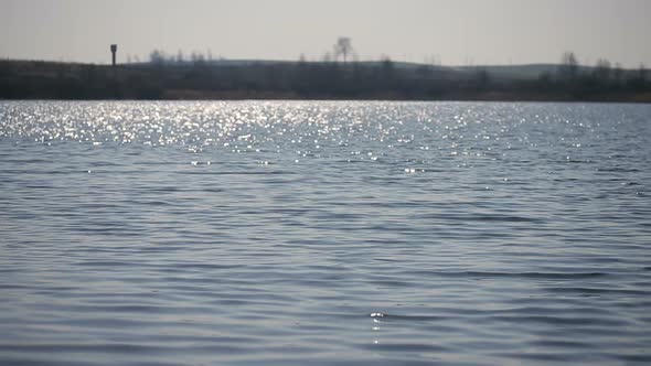 Sun Reflections at the Water Surface