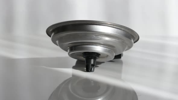 Tilting on coffee pod holder 4K close-up footage alt