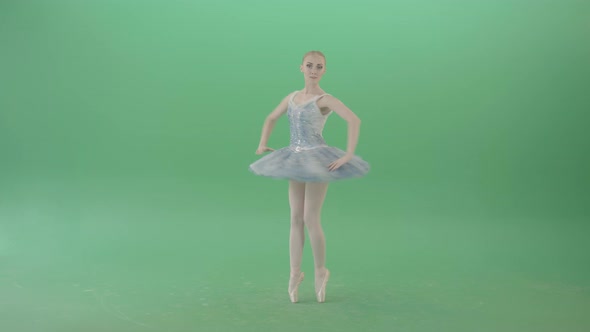 Blonde Girl With Happy Smile Spinning In Ballet Dress over Green Screen alt